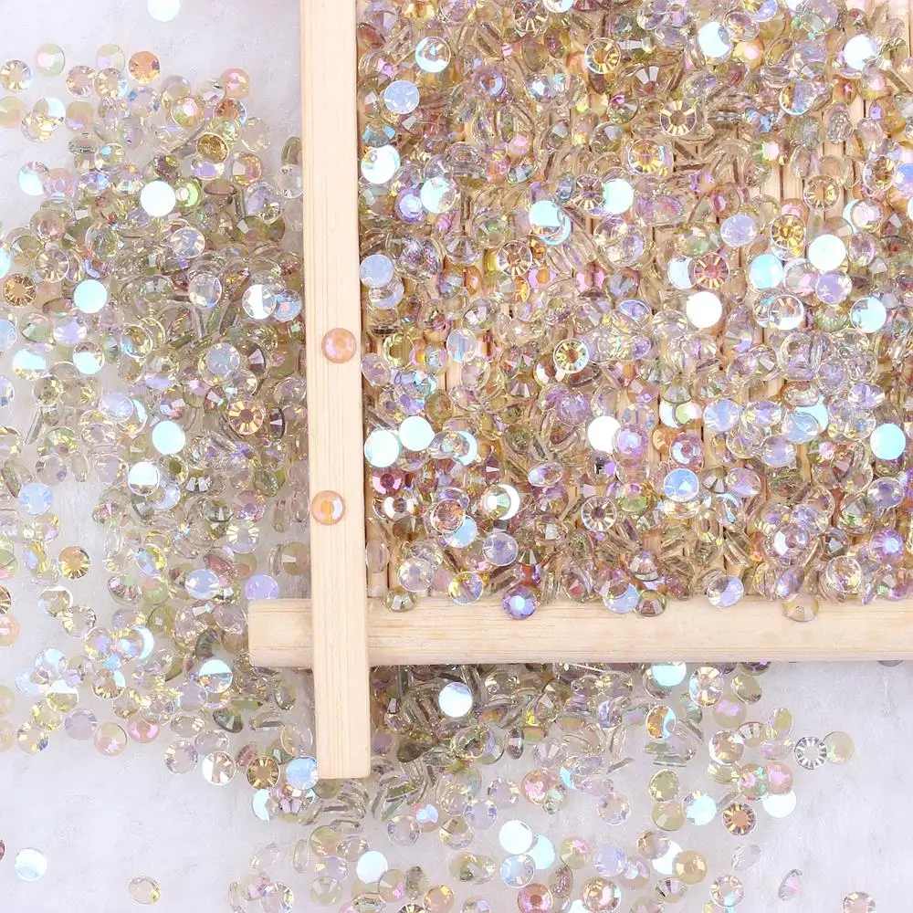 

Hot Sale Aurora AB Colors 5000pcs 3mm 3D Nail Gems Flatback Round Glue On Stones Resin Rhinestones For DIY Garment Decorations