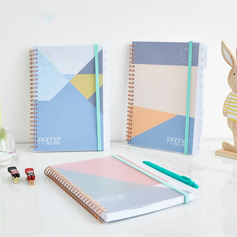 Three colorful and stylish notebooks flip the divider page 2021 English core plan this calendar this calendar this calendar