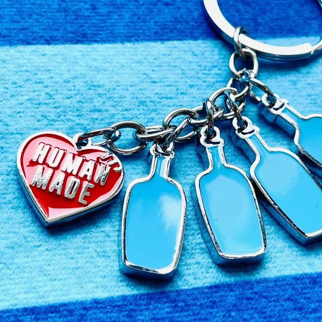 

HMUAN The correct version of the small blue bottle coffee joint red love key chain pendant