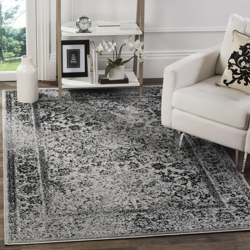 

Luxurious and Elegant Wyatt 12' x 12' Square Traditional Soft Grey and Black Area Rug, Perfect Addition for Your Living Room.