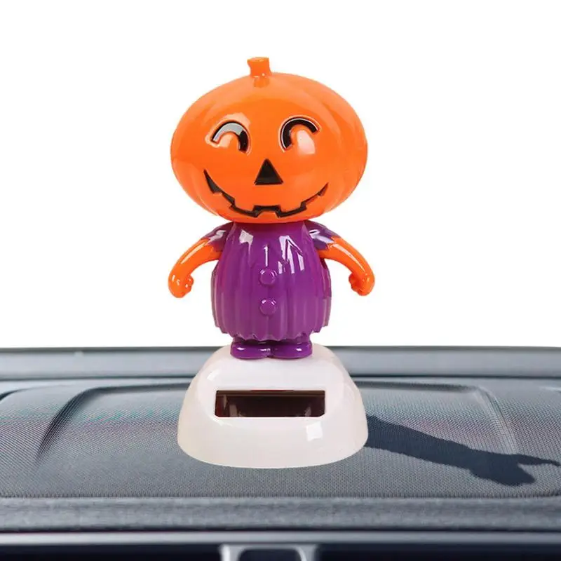 

Танцующие фигурки на солнечных батареях для Хэллоуина со скелетом-тыквой, украшения для автомобиля, игрушечные машинки на солнечных батаре...