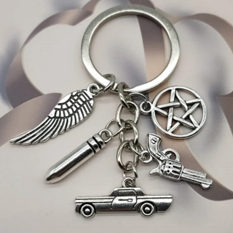 

Bullet Pentacle Pistol Wing Car Police Keychain Keyring silver color women man Jewelry Accessories Pendant Gifts Fashion