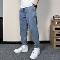 mens pants cotton style new small foot trend casual pants versatile harlan pants elastic stripe embroidered label pants