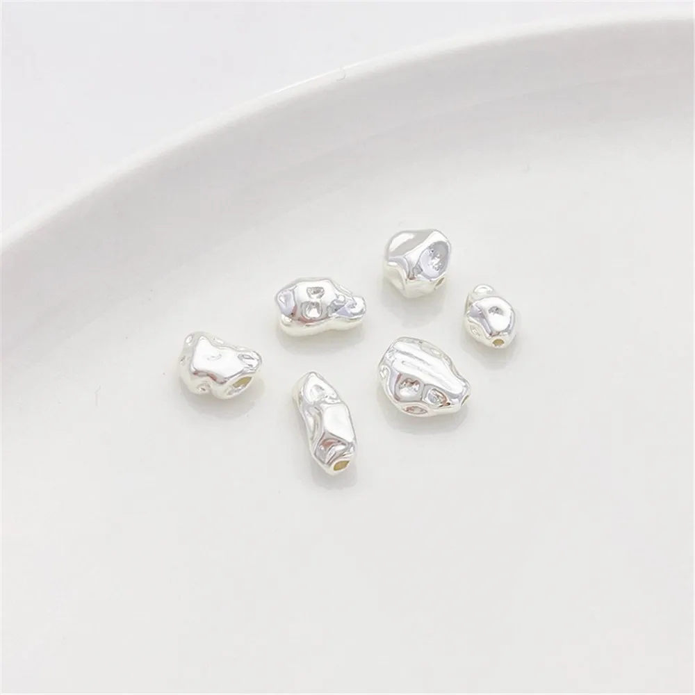 Толстые посеребренные бусины неправильной формы рассыпчатые ручной работы