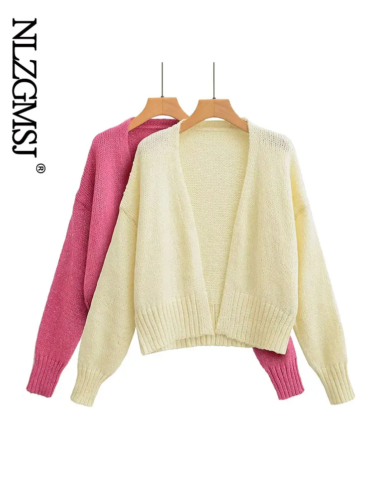 

Женский свитер с V-образным вырезом и длинными рукавами