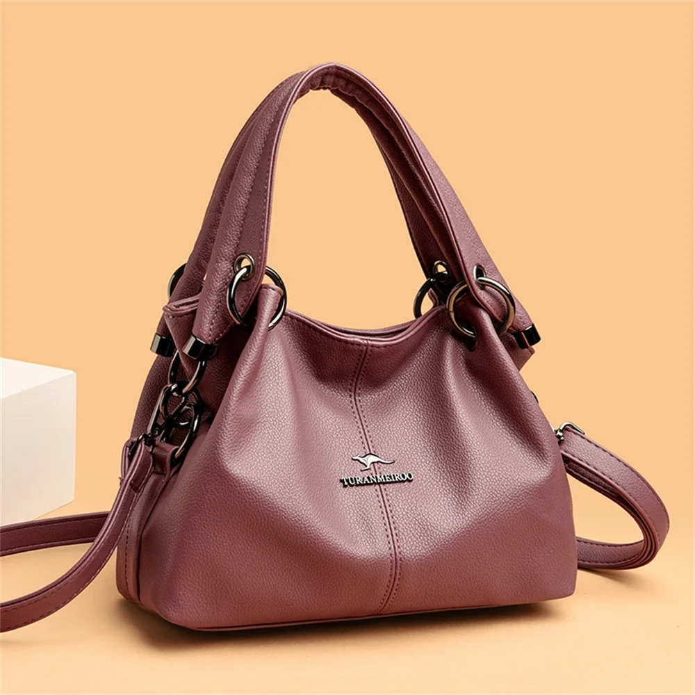 

Design fashion pleated leather bag 2022 cowhide cross border Boston Bag fashion ring sewing women's handbag