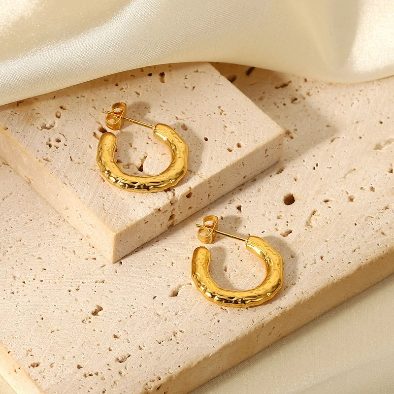 

2022 New Trendy Hollow Irregular Lava Hoop Earrings for Women Female Geometrical C Shape Gold Titanium Steel Earring Jewellery