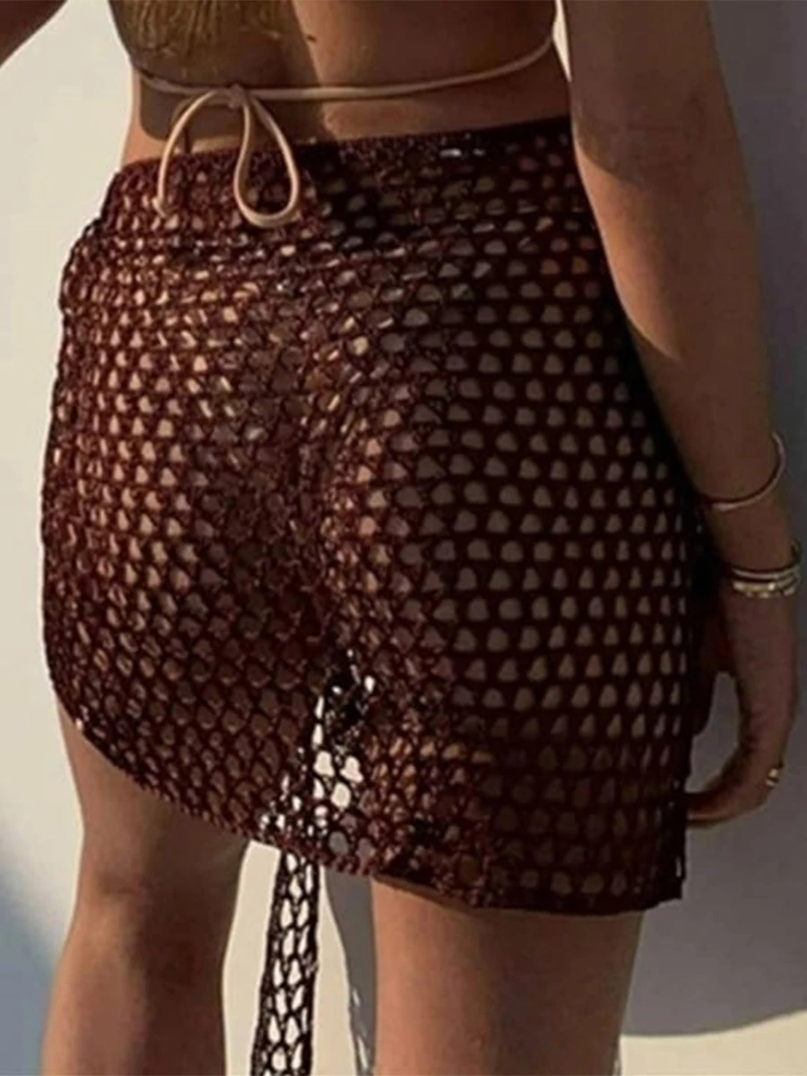 Лето 2023 женские пляжные юбки накидка полая однотонная летняя мини-вязаная юбка