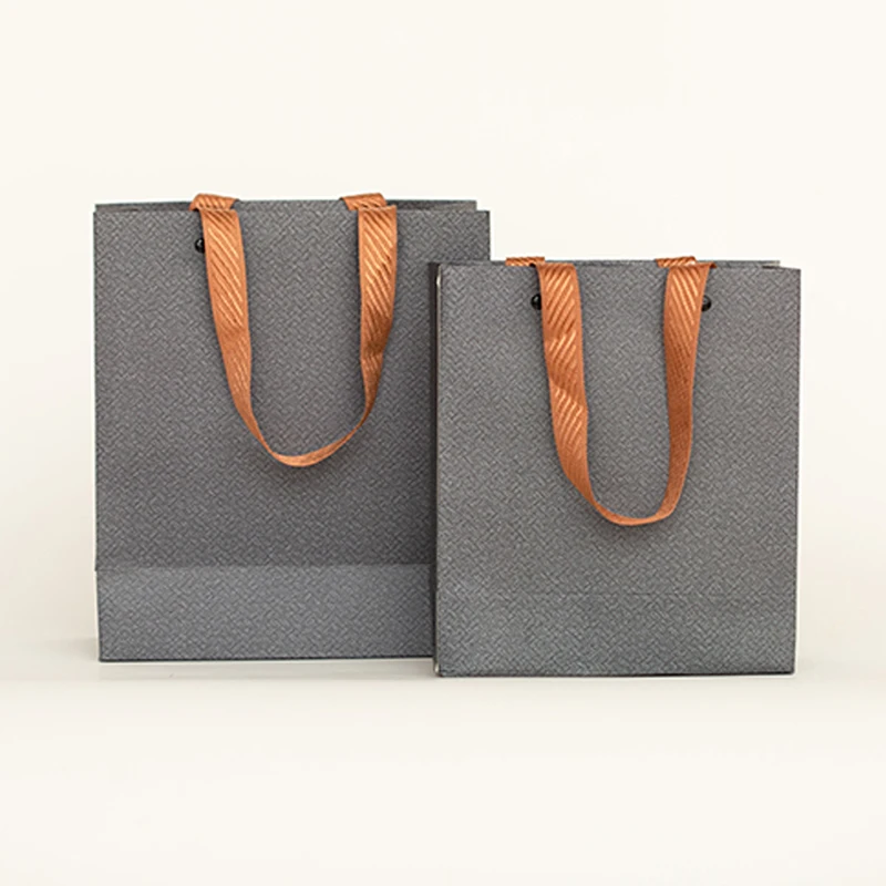 

Wholesales Custom Logo Printed Cheap Recycled New Design High Quality Shipping Eco-Friendly Twisted Handle Kraft Paper Gift Bag
