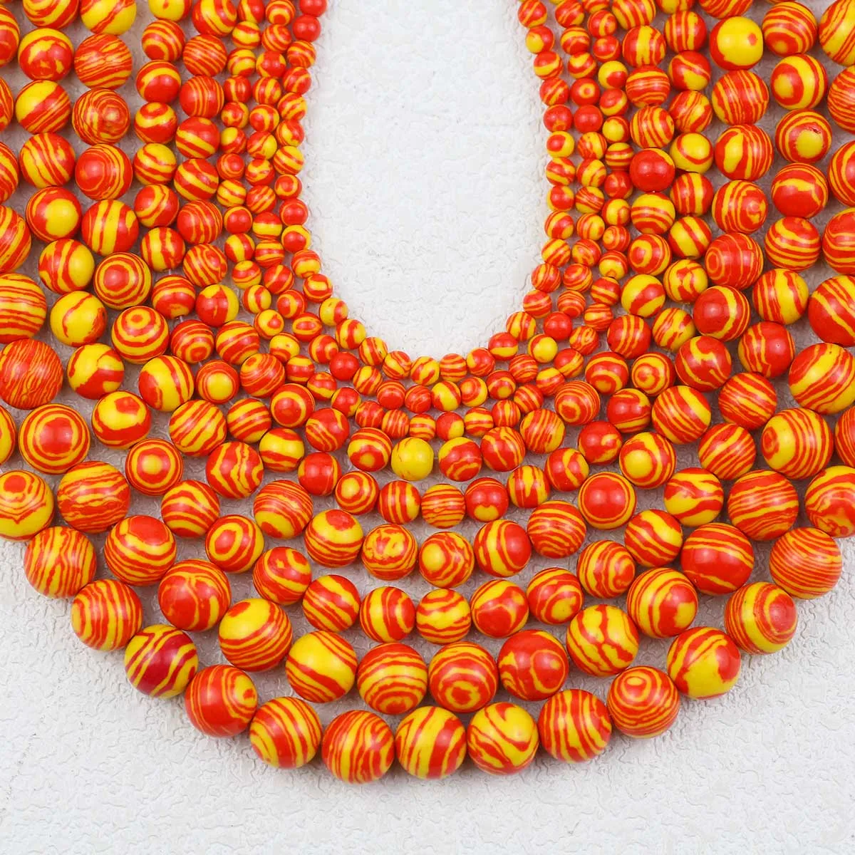 Круглые желто-оранжевые полосатые синтетические малахитовые свободные бусины