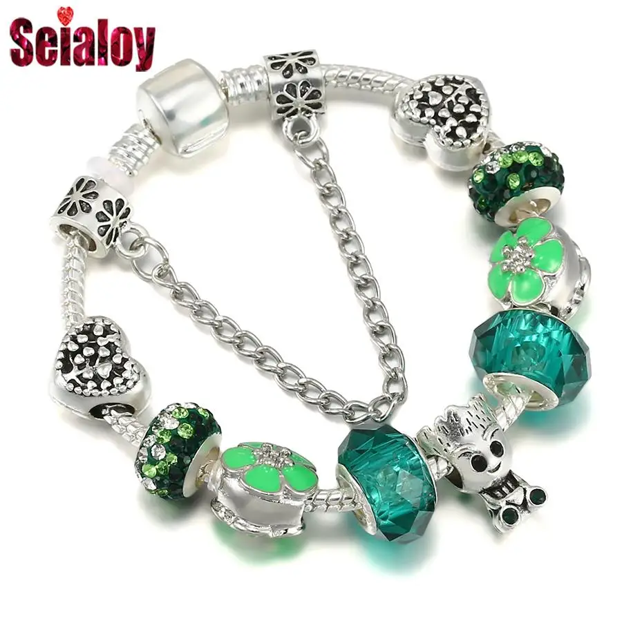 Женский браслет с подвеской в виде дерева и сердца кристаллами - купить по