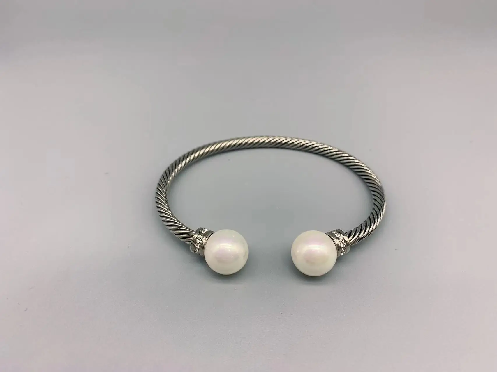 

Le Han Jewelry Silver Cable Bracelet 12MM Mother Pearl With Clear Cubie Zirconia 4MM