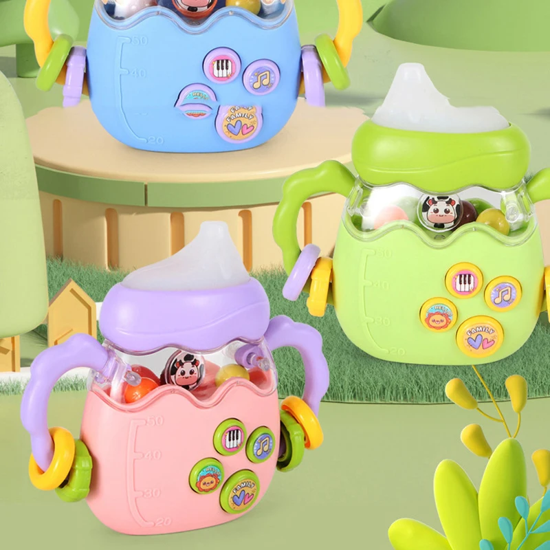 Детская развивающая игрушка-погремушка в виде бутылки