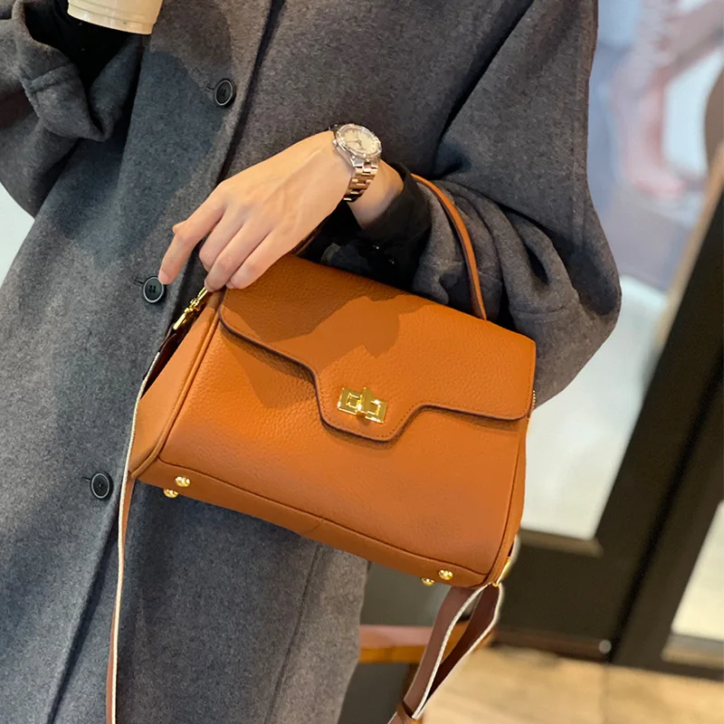 

New fashion ladies simple first layer cowhide solid color handbag large capacity first layer cowhide shoulder bag messenger bag