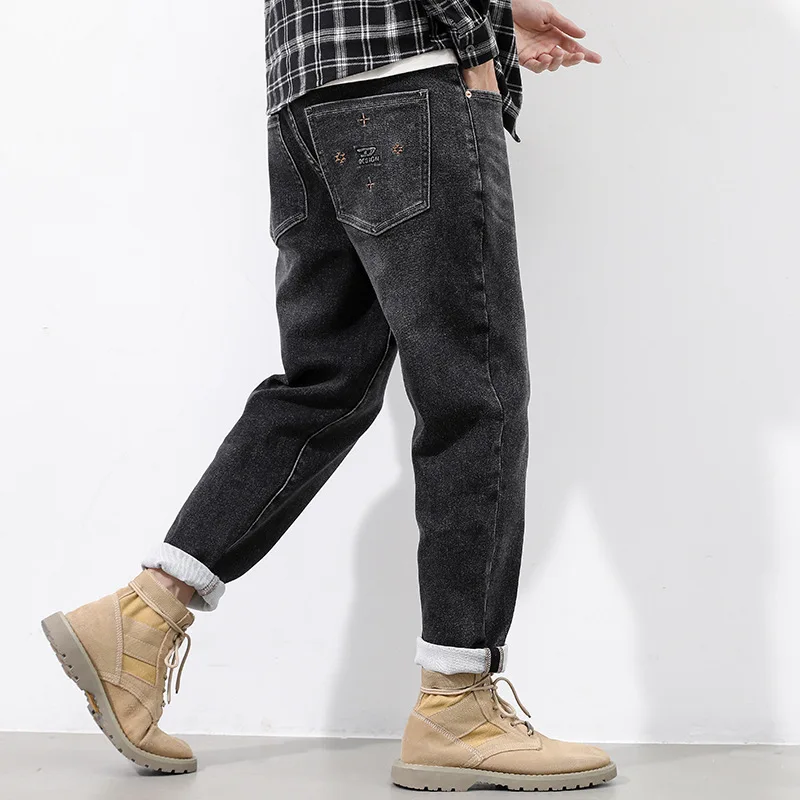 Small straight black men's jeans fashion trendy youth waist pants autumn and winter commuter stretch casual men's pants.