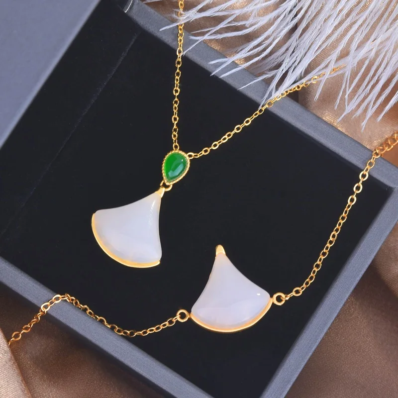 Женский ювелирный комплект из браслета и юбки