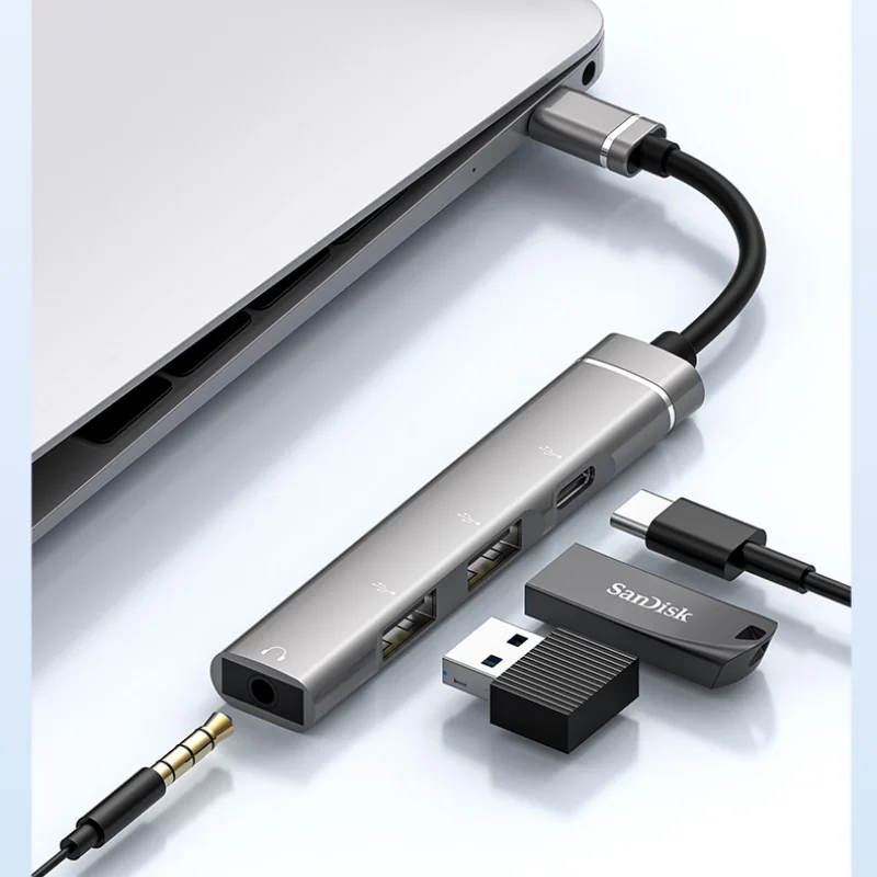 

Type-C To 3.5Mm Headphones +Usbhub Four-Port Splitter Type-C Docking Station Connected To Usb Hard Disk Keyboard.