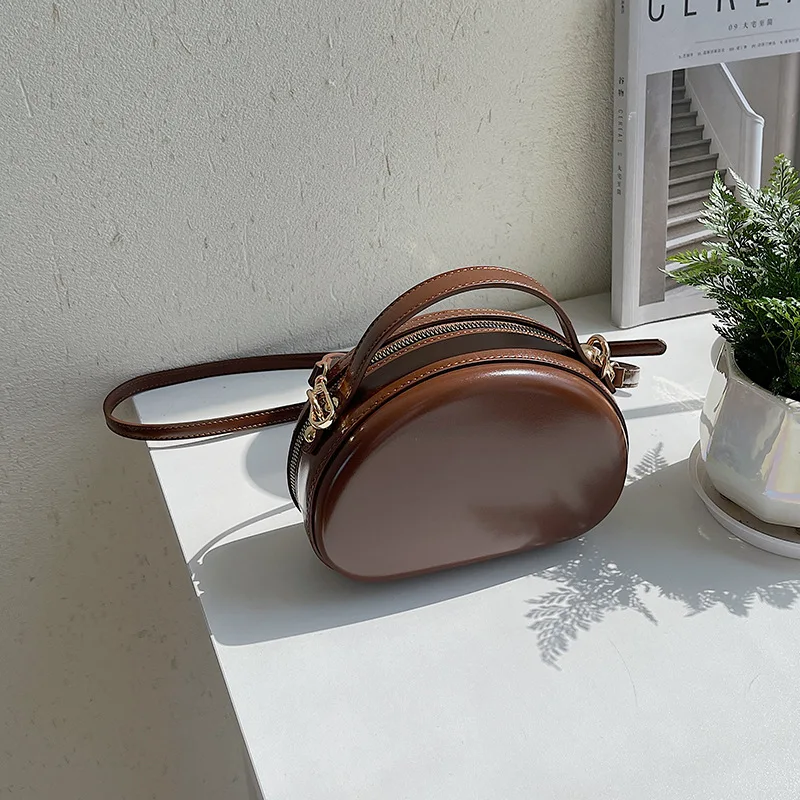 

Bag women's niche trend texture one-shoulder messenger bag solid color simple box bag fashion stereotyped portable saddle bag