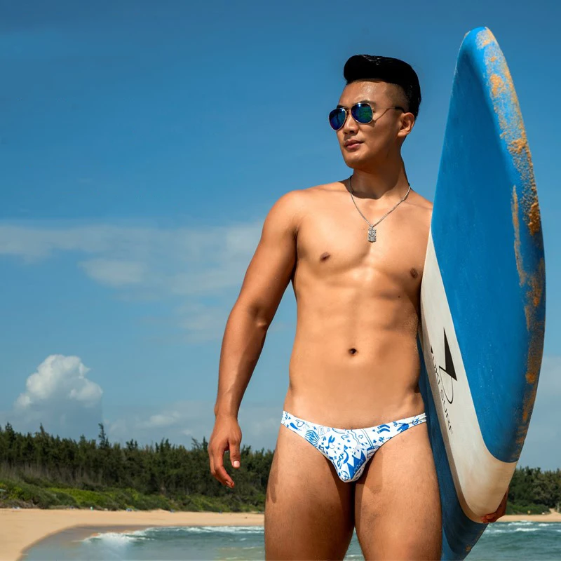 

YW9 sexy beach white graffiti men swimsuits bikini swim briefs tight low waist half pack hip men swimwear swimming bathing suits