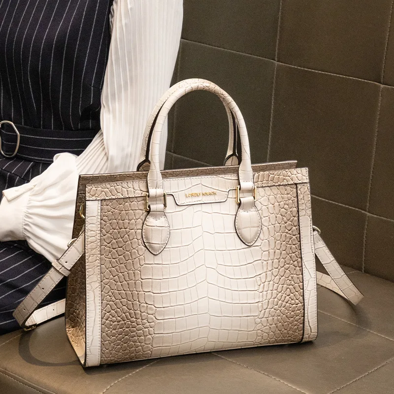 

Genuine leather large capacity portable tote bag for women's new fashion trend, high-end feeling, niche diagonal crossover bag