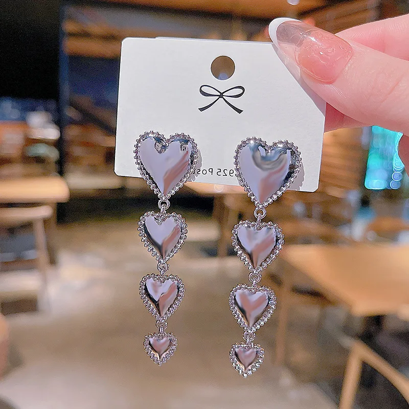 

S925 Серебряная игла версия металла ощущение долго любовь холодный ветер, Vibrato, Tiktok серьги для женщин Роскошные