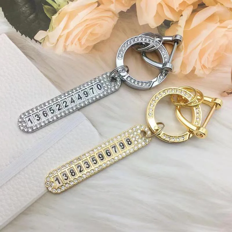 

2pcs Car accessories fashion high-grade diamond inlaid number brand key chain pendant zinc alloy horseshoe button keyring