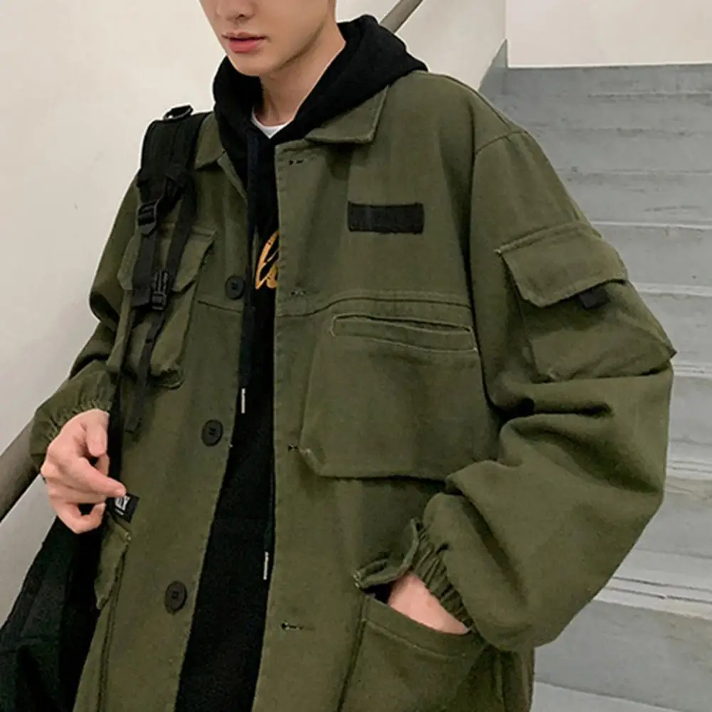 

Мужской однобортный комбинезон с эластичными манжетами и множеством карманов