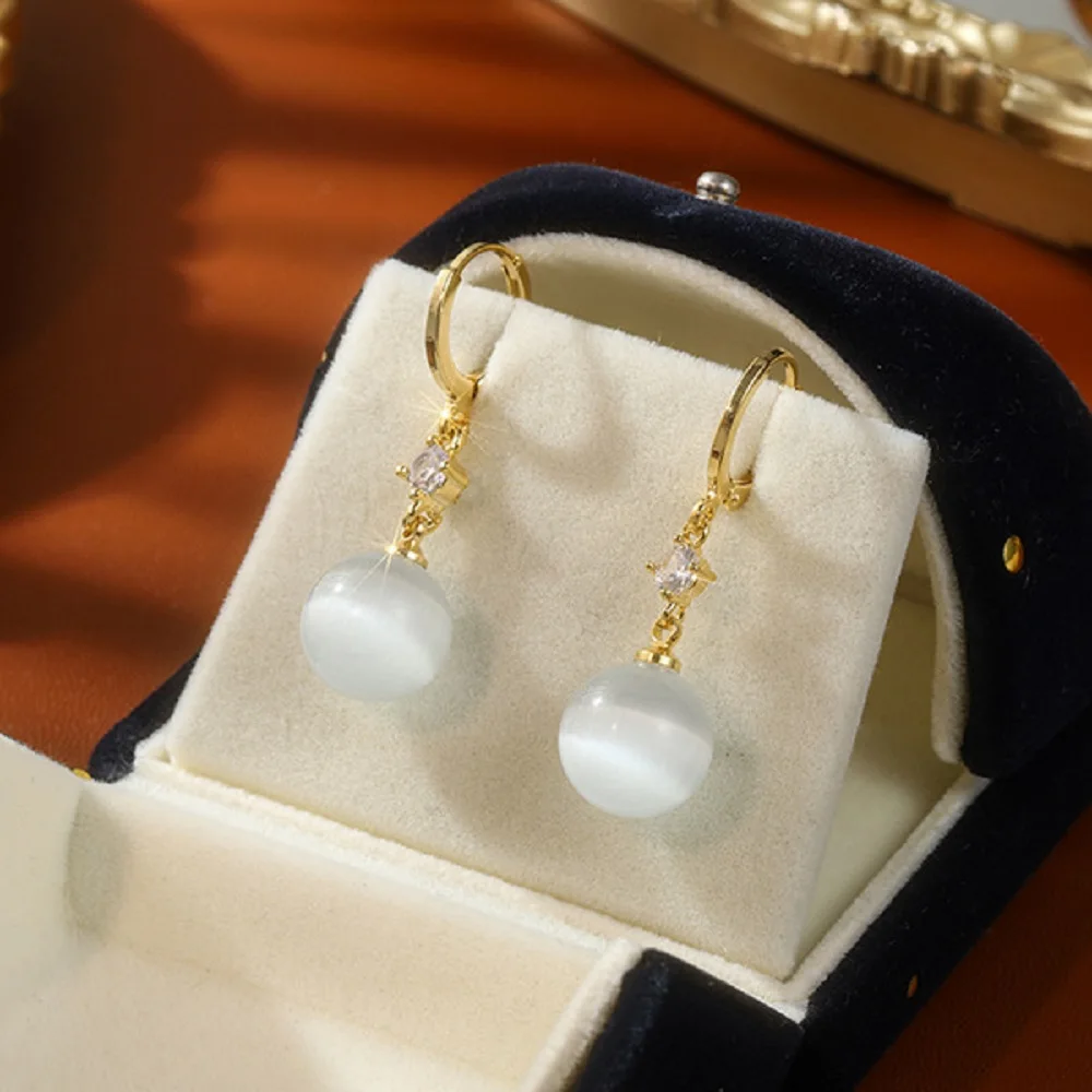 Индивидуальные простые женские серьги-подвески в виде кошачьего глаза с