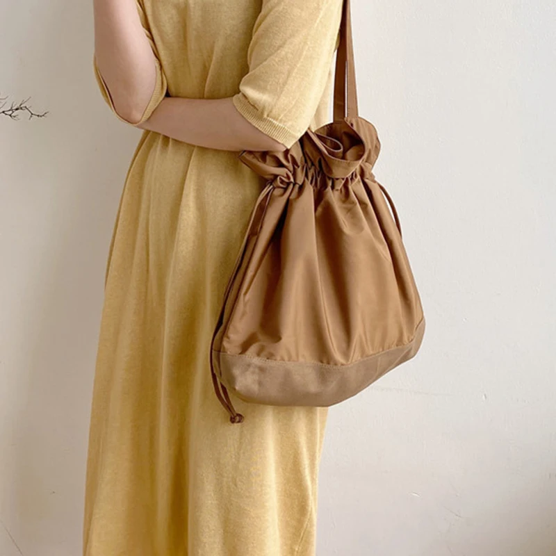 

2022 Drawstring Handbags Women Summer Fashion Large Capacity Folds Shoulder Canvas Bag Femme Casual Simple Shopping Hand Bags