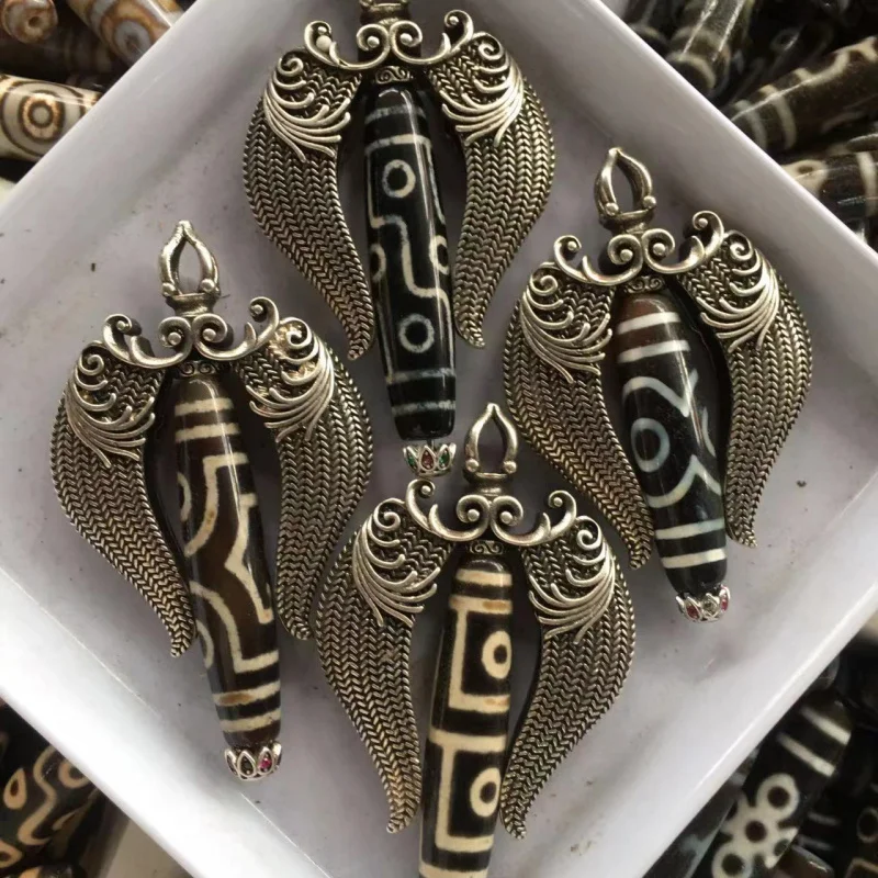 Поделки в тибетском стиле разные птицы Дапэн инкрустированные тремя четырехрьмя