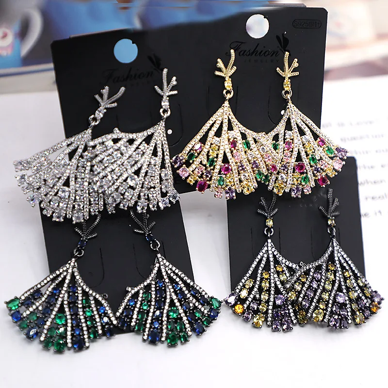 

New fashion temperament trend fan-shaped earrings European and American handmade micro-set Zircon scallop earrings