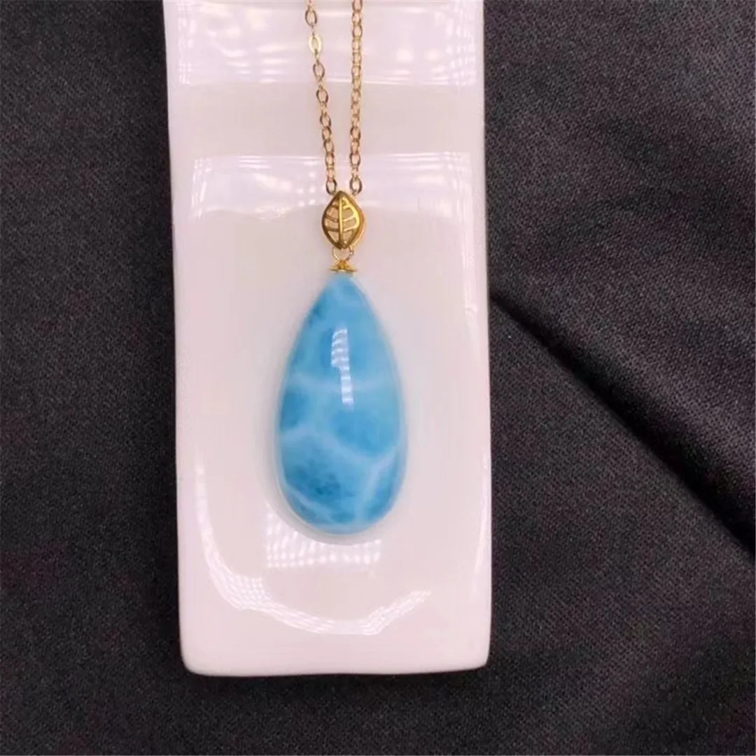 

Подвеска из натурального синего ларимара для женщин и мужчин, подарочные бусины из 18-каратного золота 25 х12х9 мм, с водяным узором, ювелирные ...