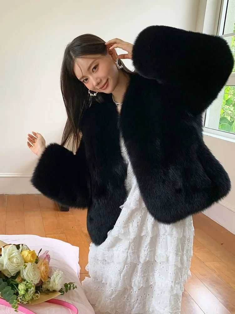 Женское зимнее пальто из натурального меха