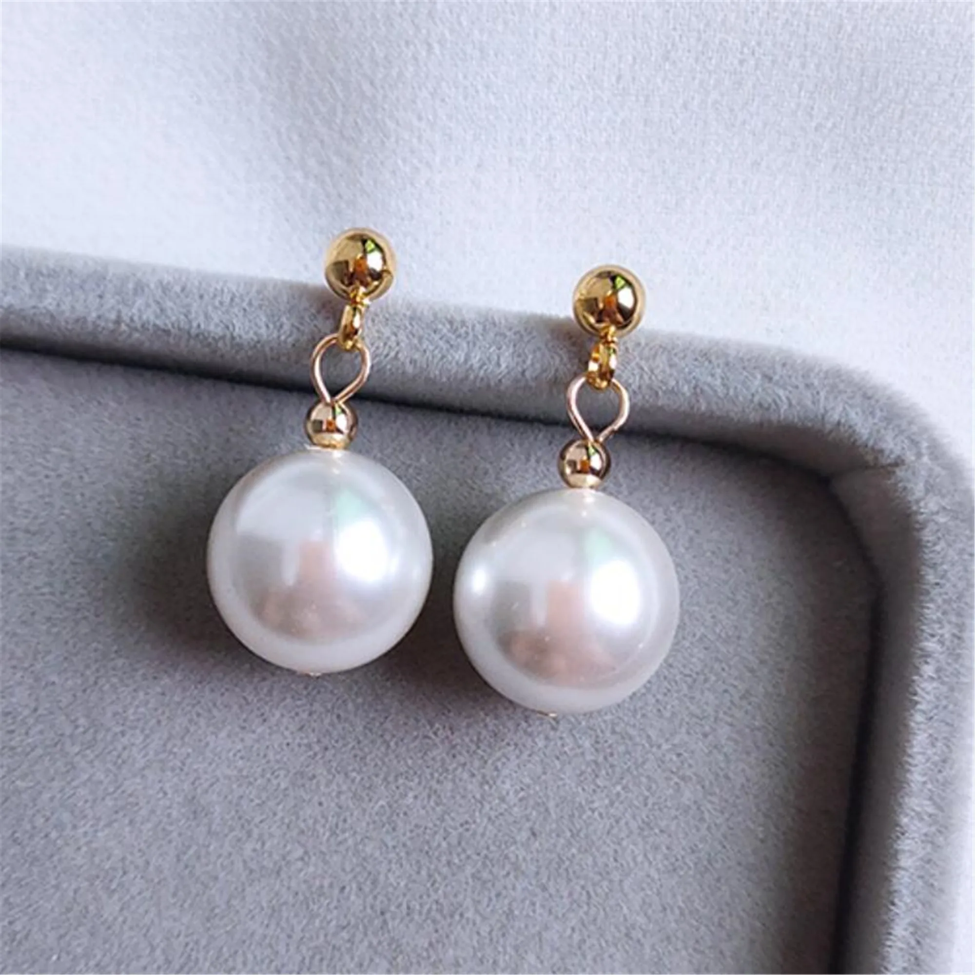 

Серьги с белыми жемчужинами в виде ракушек, 12 мм