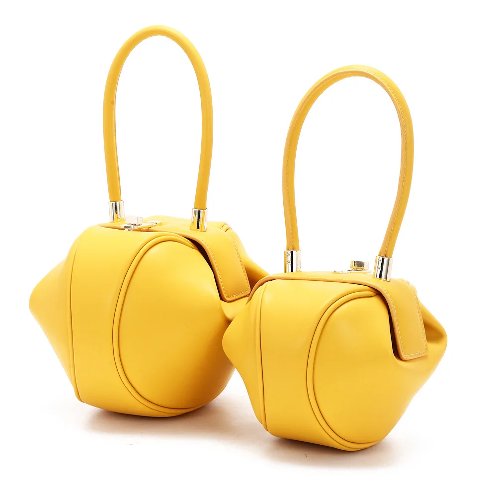 Niche design genuine leather retro Women's 2022 handbags bag  European and American buckle new fashionable dumpling satchel Wang