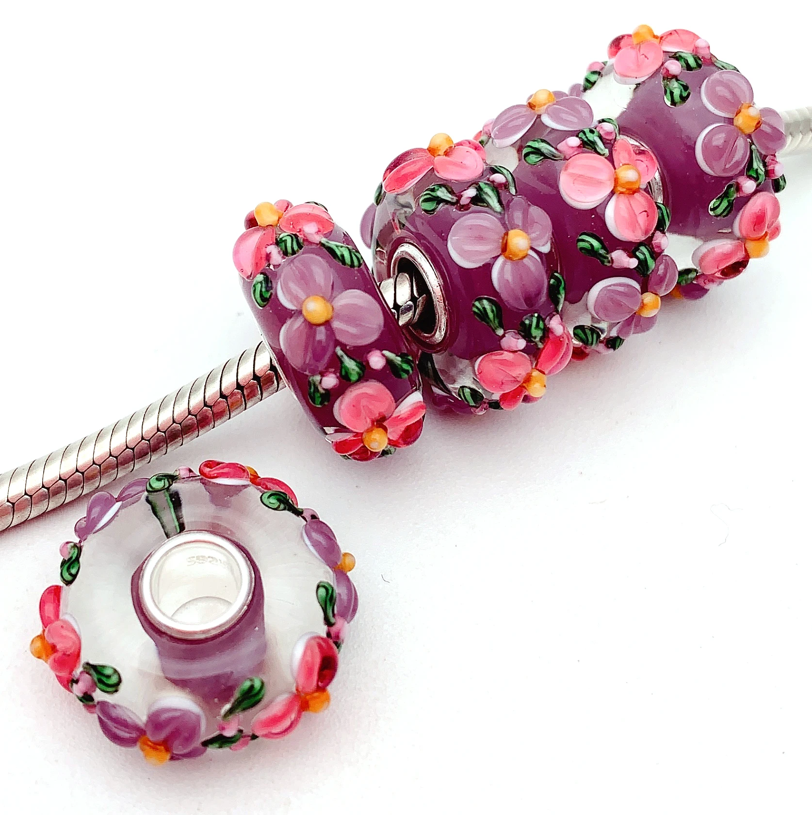 

Бусины из серебра 100% пробы с муранским стеклом