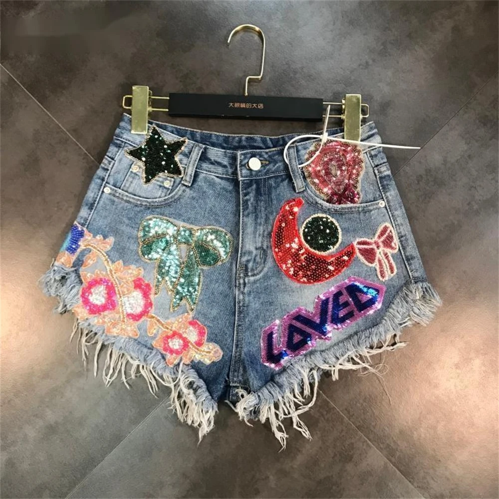 

2022 New Arrivals Moon Stars Sequins Embroidery Tassel Patch Raw Denim Shorts Female Fashion Temperament Tide Women