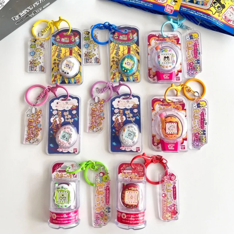Фото Электронный питомец-брелок Bandai Tamagotchi, коллекционный шокуган, подвеска для сумки, в подарочной коробке, коллекционный сувенир, игрушка для коллекционеров №2