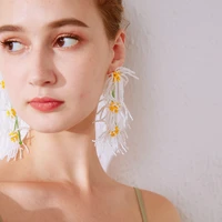 hand beaded long earrings exaggerated white daisy petals fringe earrings for female niche temperament holiday style earrings