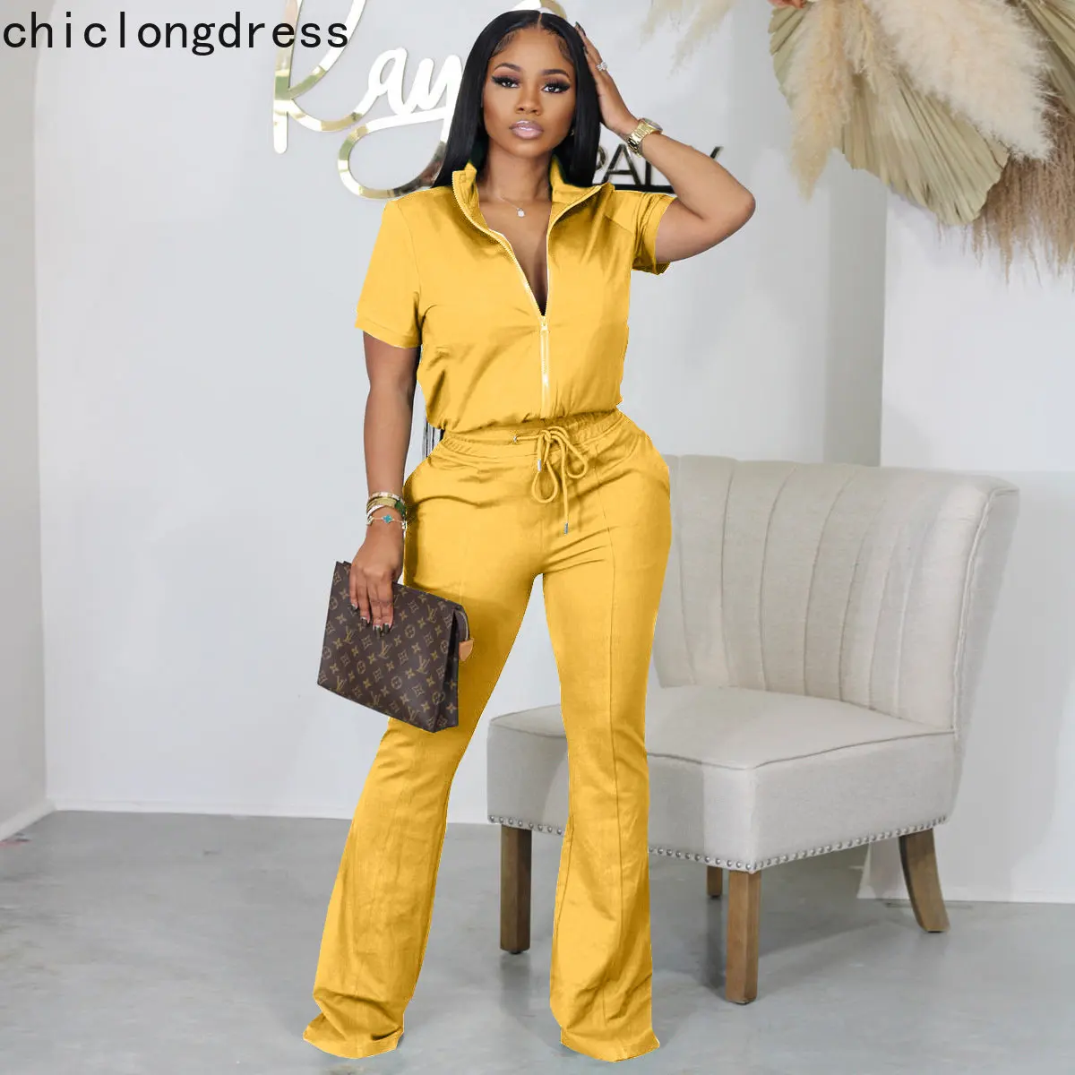 

2023Spring Summer Casual Two Piece Set Women Sports Style Zipper Stand Collar Tshirt Drawstring Flare Pants Two Piece Suit Women