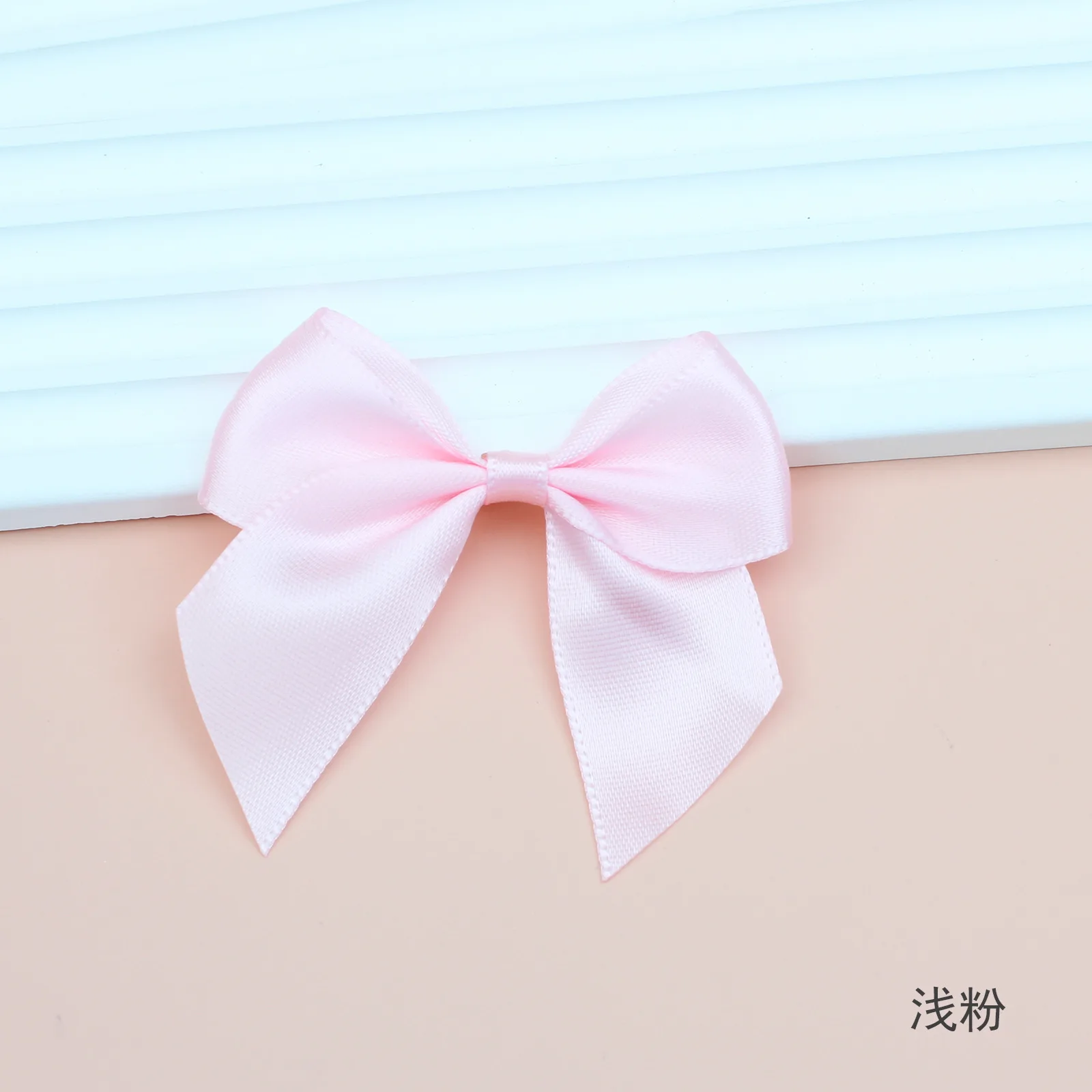 

Розовые атласные банты 50 шт