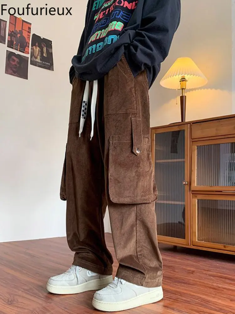 

Мужские вельветовые брюки Foufurieux, винтажные коричневые карго с карманами, большие размеры, корейские широкие брюки в стиле хип-хоп для мужчи...
