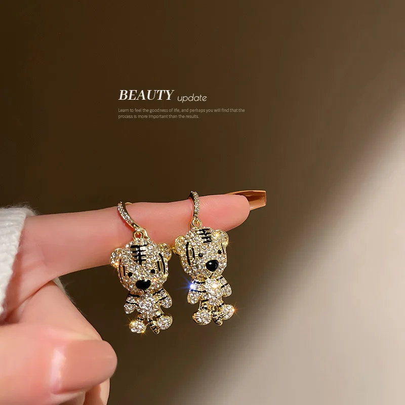 

In The Year Of Tiger, Earrings Are Set With Diamonds. Three-dimensional Small Tiger Lat