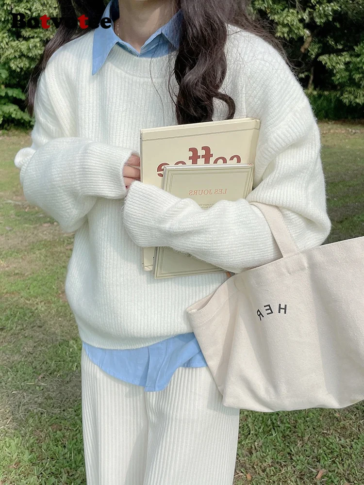 Женский свитер свободного покроя с длинным рукавом и круглым вырезом |