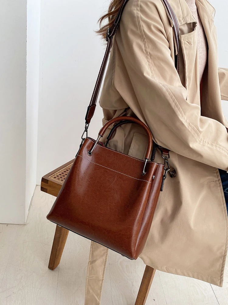 

Кожаная сумка-мешок для женщин, вместительный мессенджер из воловьей кожи, яркая портативная Сумочка на плечо