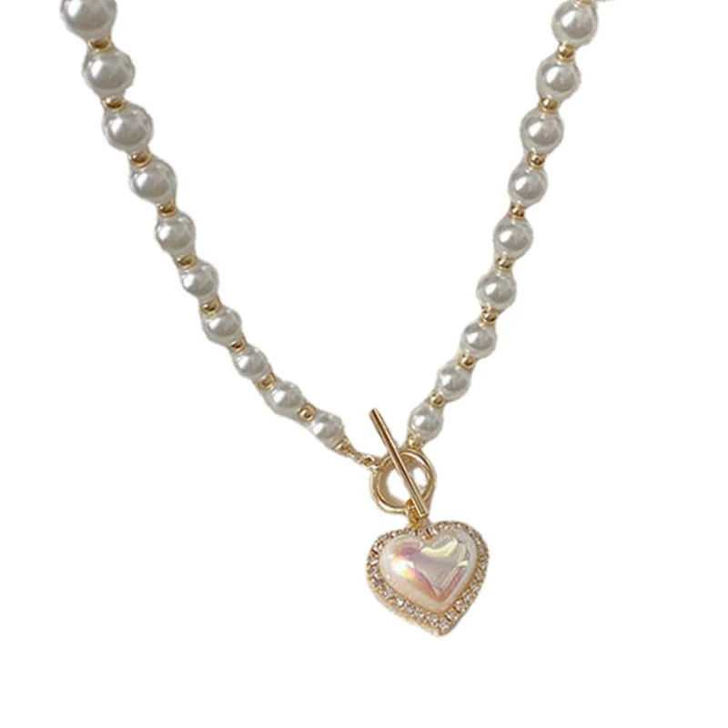 

2022 New Temperament Imitation Pearl Love Necklace Cold Wind Sweet Simple Buckle Clavicle Chain Necklace for Women Wholesale