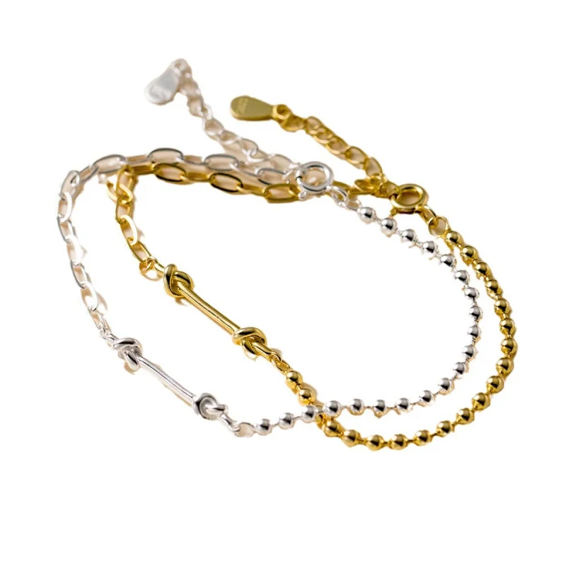 Браслет из серебра 925 пробы с изгибами и подвесками