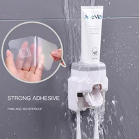 bathroom accessories toothpaste dispenser wall mount toothbrush holder set bathroom shower rolling automatic toothpaste squeezer