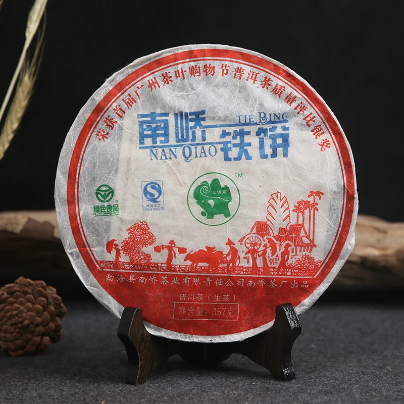 

Nan Qiao Tie Bing Without Teapot 2007 Nanqiao Bulang Arbor Tree Raw Puer Tea 357g Shen Pu Er Tea Pu Erh No Tea Pot