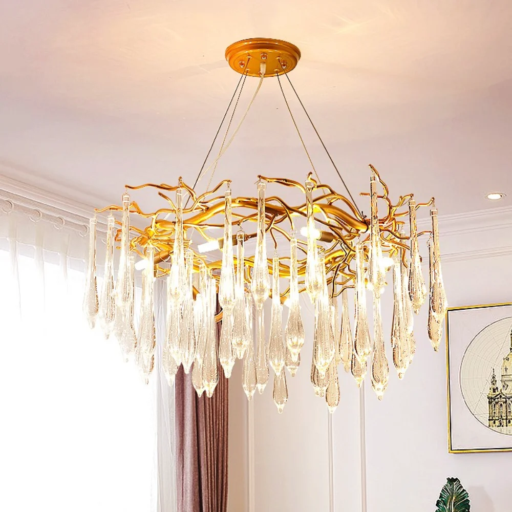 

French style luxury crystal chandeliers with golden branches in the living room for romantic wedding lighting